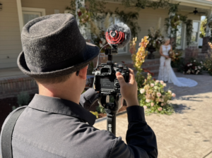 Evermoore Films Videographer filming a wedding